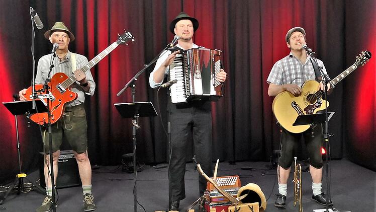 Das Mundart-Trio Spilk mit (von links) Joachim Bühner, Frank Schmitt und Martin Reinhard beim Online-Auftritt im Jahr 2021