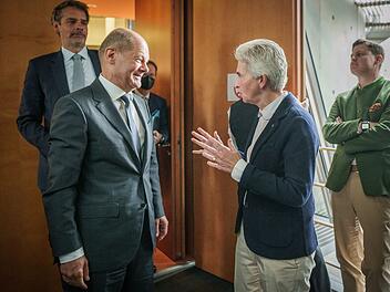 Olaf Scholz und Marie-Agnes Strack-Zimmermann