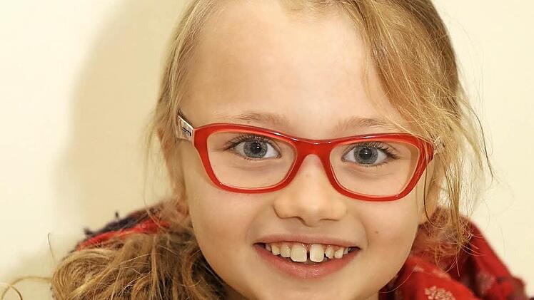 Sarah (8) aus Bamberg: "Mir hat es heute sehr gut gefallen. Ich fand es schön, dass uns der Professor so viel erklärt hat. Ich wusste noch nicht, dass das Wort ,bescheuert‘ von ,scheuern‘ kommt. Ich gebe dem Professor eine Eins plus mit Sternchen, weil er alles so gut erklärt hat." Foto: Barbara Herbst
