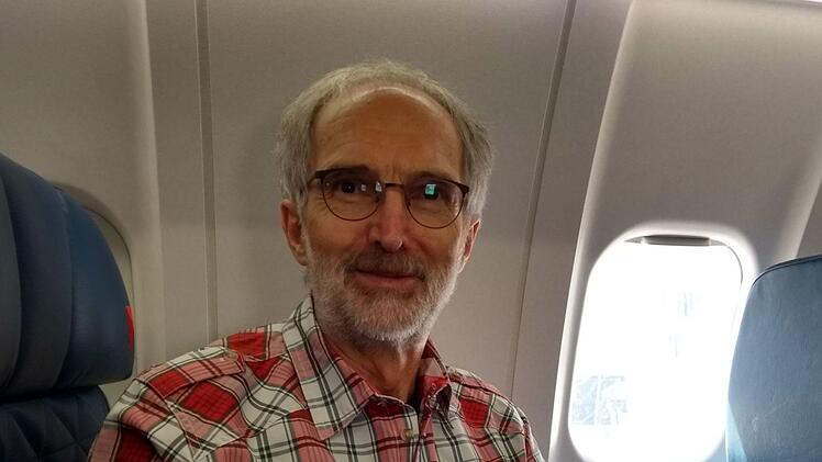 Thomas Helfrich auf dem Flug nach Rochester.Michael Wiegand