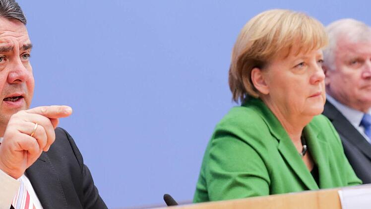 Die Parteichefs Sigmar Gabriel, Angela Merkel und Horst Seehofer.