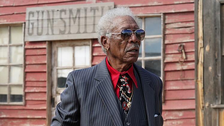 Der Mafia-Finanzier Reggie Fontaine (Morgan Freeman) schaut nach dem Rechten beim Western-Filmdreh. Er will sein Geld zur&uuml;ck.