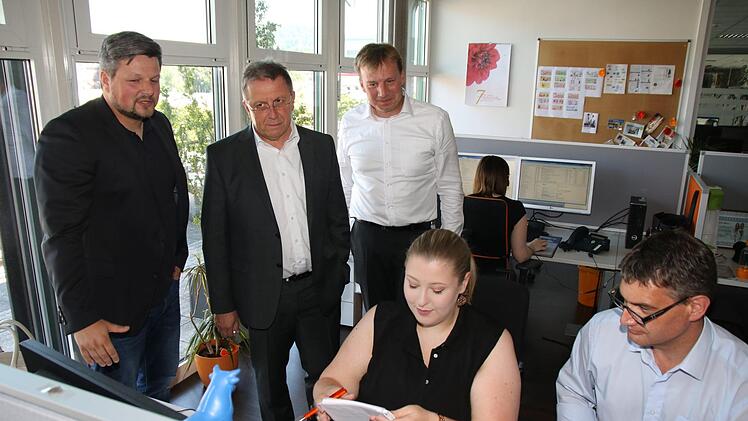 Oberbürgermeister Henry Schramm zu Gast bei Flatex Foto: Dagmar Besand