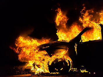 Car in fire, burning