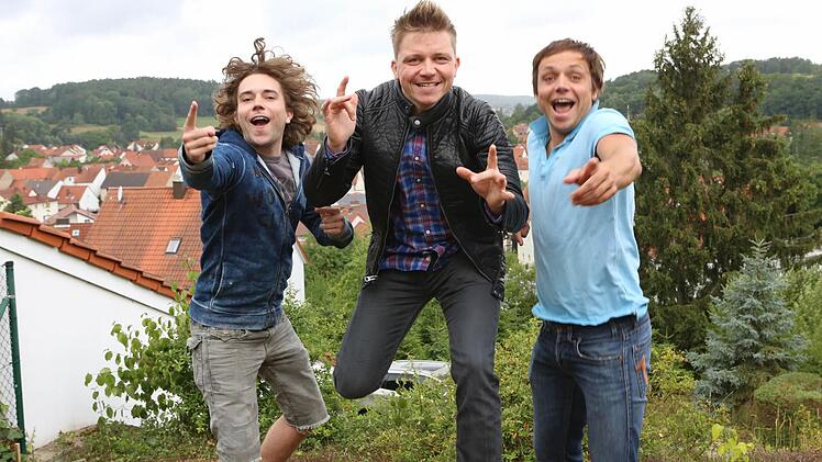 Die Dorfrocker, das sind die Brüder Philipp, Tobias und Markus Thomann aus Kirchaich im Landkreis Haßberge Foto. Barbara Herbst