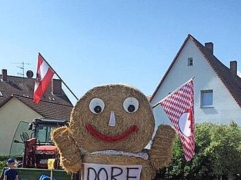 Das Strohmännchen bittet zum Dorffest in Wiesendorf. Foto: privat