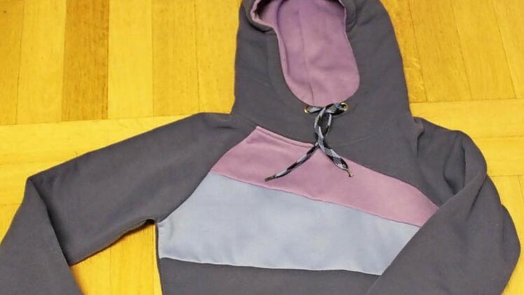 Moderner Pullover über "share and care""