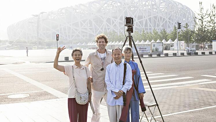 Fotograf Christian Höhn (Mitte) in Peking. Foto: privat