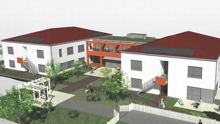 Das geplante Wohnheim der Lebenshilfe Haßberge in der Goethestraße in der Kreisstadt Haßfurt soll so aussehen. Bei der Mitgliederversammlung stellten Markus Kuhn und Architekt Jan Schrepfer vom Planungsbüro das 4,36 Millionen-Euro Projekt näher vor. Fotos: Ralf Naumann