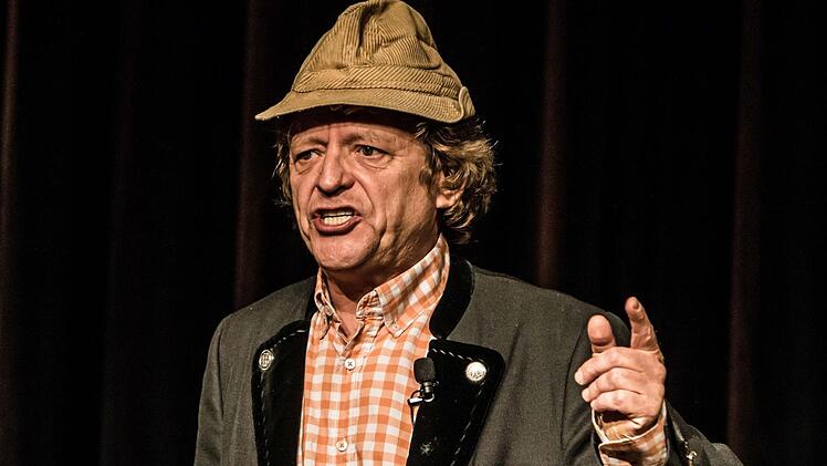 Wie der Kabarettist Frank-Markus Barwasser im ausverkauften Kongresshaus die Bühne zur Kanzel werden lässt.