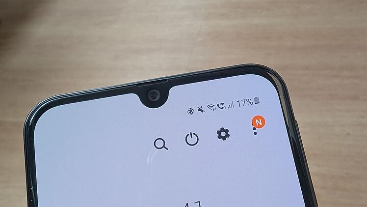 Was bedeuten die Pfeile auf dem Handy?