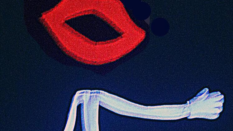 Unsichtbares Licht zaubert dieses tanzende Strichmännchen mit dem Riesen-Mund auf die Bühne. Die Zuschauer fühlen sich fast wir im Prager Schwarzlicht-Theater.  Dieter Britz