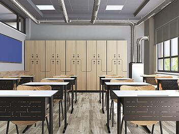 Viel Platz benötigen Lüftungsgeräte im Klassenzimmer nicht (hinten rechts). Die Lüftungsrohre verlaufen an der Decke.