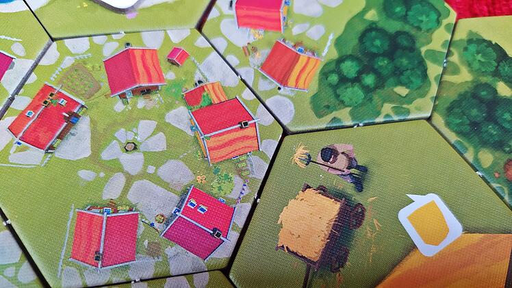 Spiele-Test Dorfromantik - das Brettspiel:  Entspannter Landschaftsbau mit Sogwirkung