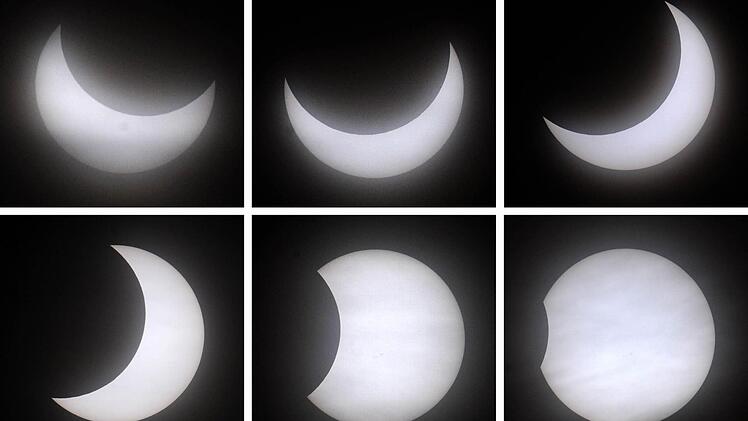 Verschiedene Phasen der partiellen Sonnenfinsternis. Foto: Tobias Hase/dpa