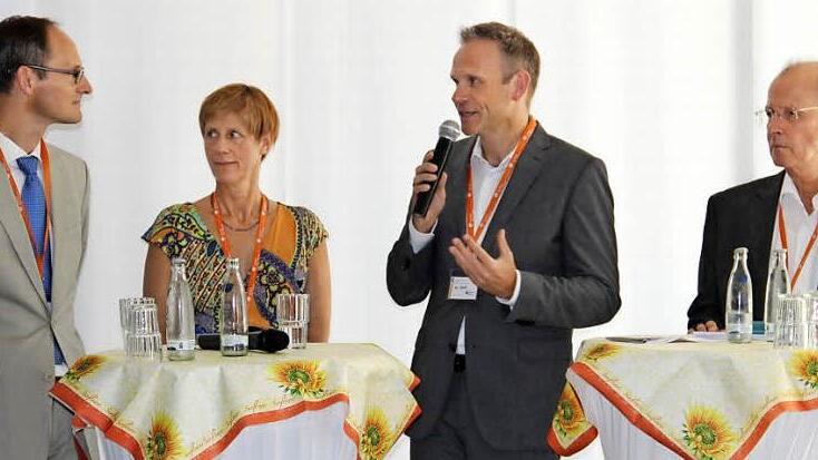 Christof Lawall, Wiebke Voigt, Professor Andreas Koch und Volker Weisinger (von links) bei der Podiumsdiskussion Foto: Katharina Müller-Sanke
