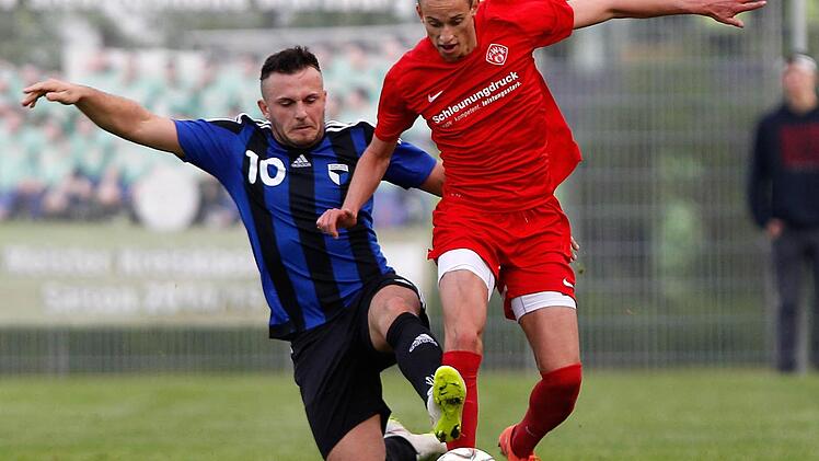 Adem Selmani (li.). Foto: Frank Scheuring