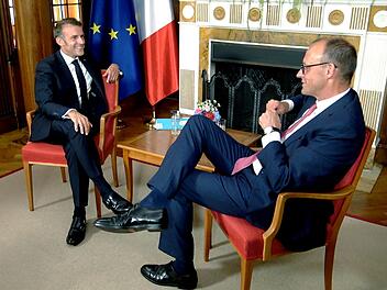 Frankreichs Pr&auml;sident Emmanuel Macron (links) und der deutsche Bundeskanzler Friedrich Merz m&uuml;ssen h&auml;ufig Meinungsverschiedenheiten aushandeln - etwa in Bezug auf das Mercosur-Abkommen.