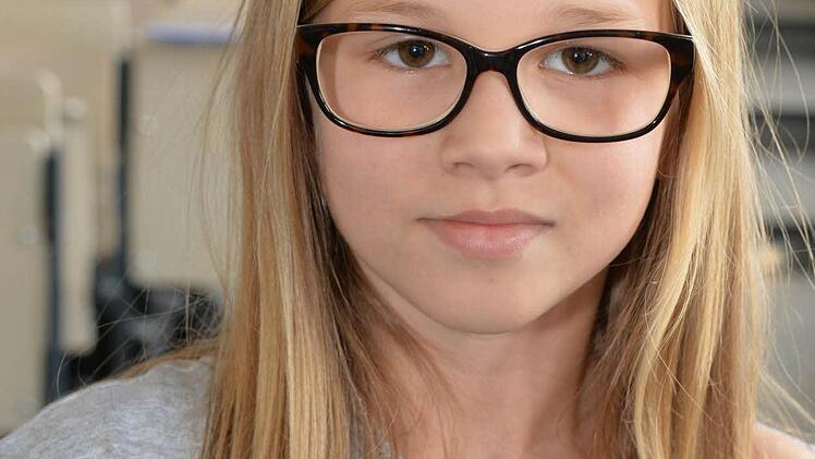 Alicia (9): "Vorher hatte ich noch nicht so richtig daran gedacht, dass es noch ein Leben nach dem Tod gibt. Es ist auch bisher noch niemand in meinem Umfeld gestorben. Nach der Vorlesung fühle ich mich jetzt besser." Foto: Ronald Rinklef
