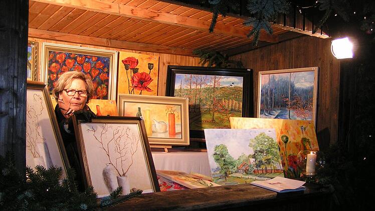 Stand des Weilersbacher Malers Oskar Kohl - im Stand seine Ehefrau Erika Foto: Heidi Amon