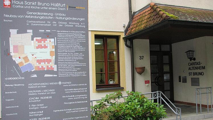 Caritas und Kirche unter einem Dach. Schon auf der Bautafel ist zu sehen, dass im Caritas-Altenheim St. Bruno in der Haßfurter Promenade etwas Besonderes entsteht.