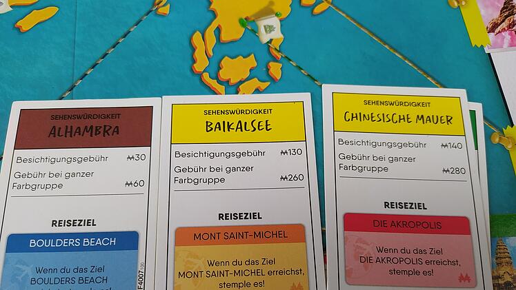 Spiele-Test Monopoly - Reise um die Welt: So spielt sich die Urlaubs-Variante des Brettspiel-Klassikers