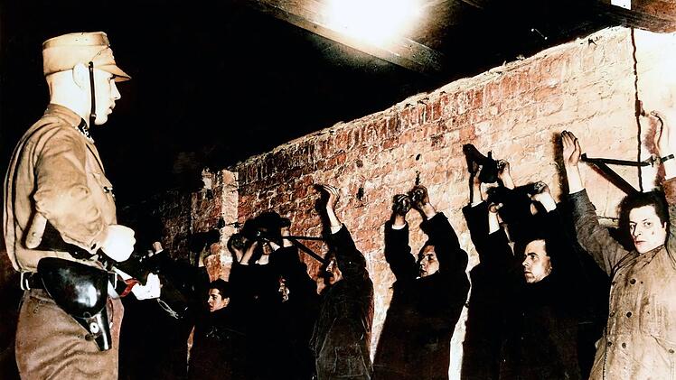 Verhaftung von kommunistischen Aktivisten durch die SA: Binnen weniger Stunden nach dem Reichstagsbrand werden Tausende Oppositionelle in den ersten nationalsozialistischen Konzentrationslagern interniert.