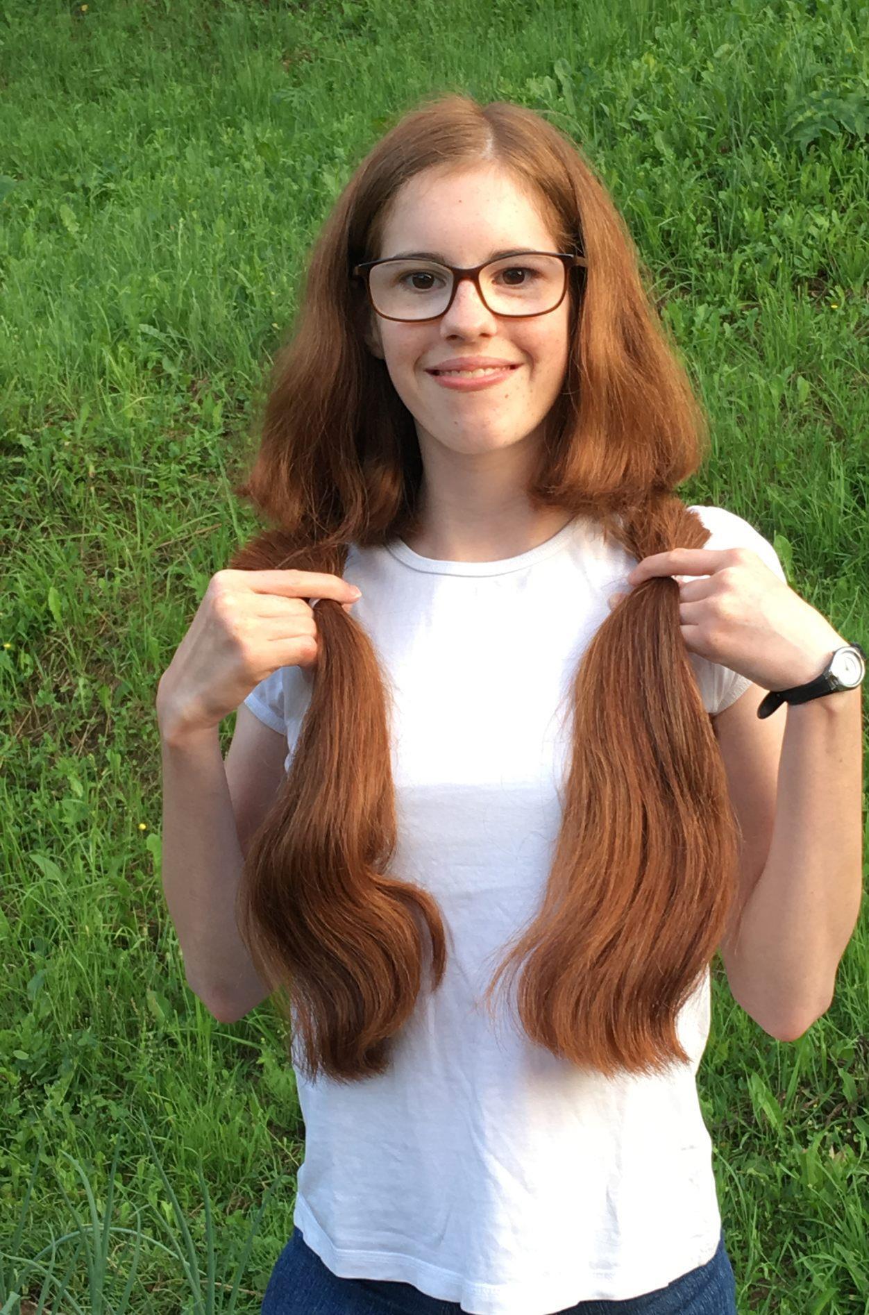 junge eltmannerin schnitt zopfe fur den