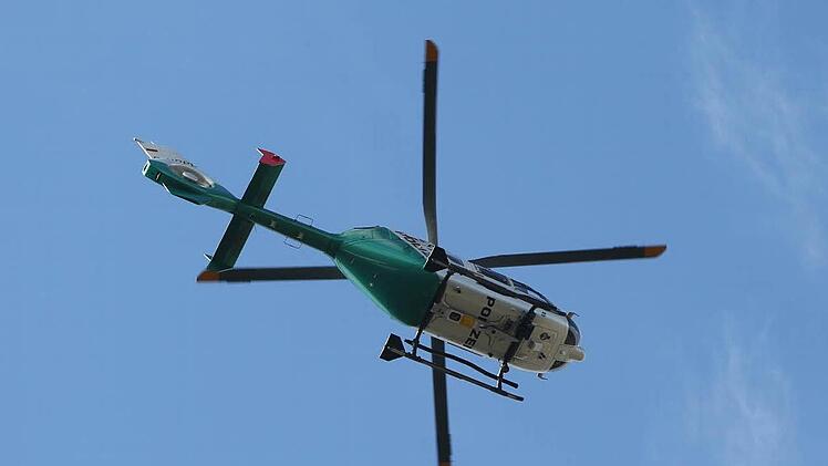 Bei der Suche nach dem Vermissten war auch ein Polizeihubschrauber im Einsatz.  Symbolbild: