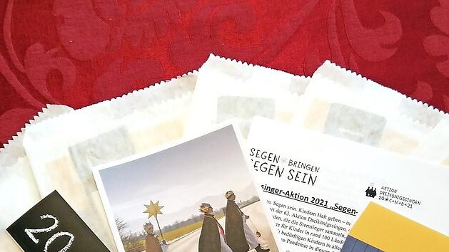 Die "Segen-to-go"-Pakete der Pfarrei St. Kilian beinhalten den Segen der Sternsinger, einen Infoflyer zur Aktion, einen geweihten Segensaufkleber f&uuml;r die Haust&uuml;r und eine Spendent&uuml;te. Foto: privat