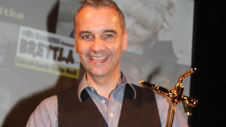 Stefan Kröll gewann den  Kleinkunstpreis des "Kulmbacher Brettla".Sonny Adam