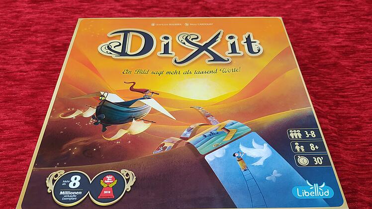 Spiele-Test Dixit: Rezension des fantasievollen Kommunikationsspiels - Spiel des Jahres 2010