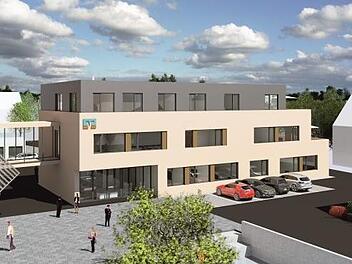 Die Hauptstelle der Raiffeisenbank Altenkunstadt muss aus Platzgründen erweitert werden. Der Altbau (links) wird über eine Verbindungsbrücke mit dem dreigeschossigen Neubau verbunden.  Stephan Stöckel