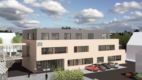 Die Hauptstelle der Raiffeisenbank Altenkunstadt muss aus Platzgründen erweitert werden. Der Altbau (links) wird über eine Verbindungsbrücke mit dem dreigeschossigen Neubau verbunden.  Stephan Stöckel