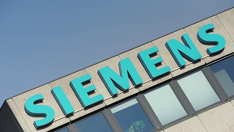 Der Stellenabbau bei Siemens fällt weniger drastisch aFoto: Andreas Gebert/dpa