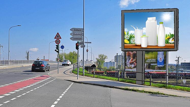 Die Fotomontage zeigt, wo beispielsweise  am Pfisterberg anstelle der konventionellen Plakatwand ein digitaler Werbeträger stehen könnte. Foto: Ronald Rinklef / Retusche: Franziska Schäfer