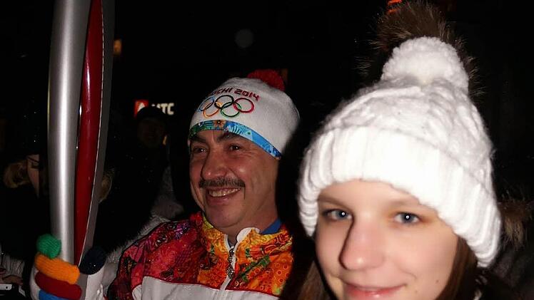 Lena mit dem olympischen Feuer.