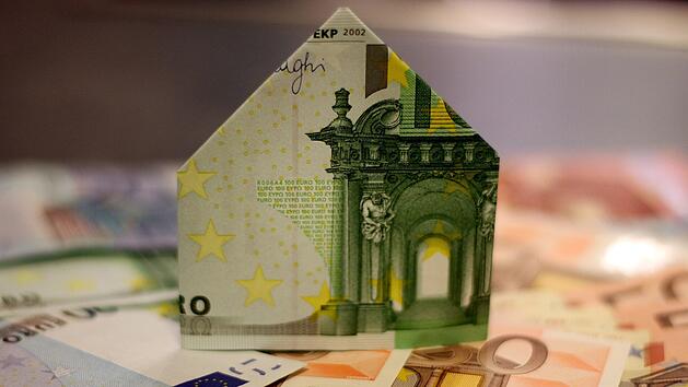 Symbolbild: Haus, Geld, Erbe
