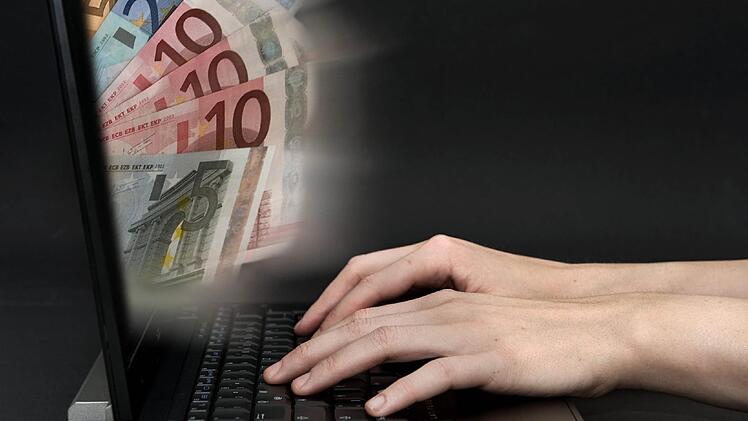 Bankgeschäfte per Computer und Handy werden immer beliebter. Jens Schierenbeck/dpa