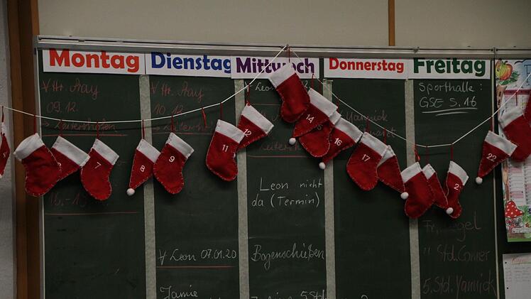 Wochenplan der Intensivgruppe: Die Termine der Kinder stehen an der Tafel geschrieben. Foto: Ulrike Müller