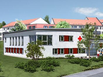 So wie auf dieser Fotomontage soll die neue Höchstadter Rettungswache des BRK einmal aussehen. Im Hintergrund das bestehende Altenheim. Foto: Andreas Dorsch