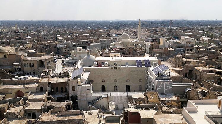 Die Stadt Mossul, historische Metropole im Nordirak, war ein Schmelztiegel der Religionen und f&uuml;r ihren Multikulturalismus bekannt. Nach der Zerst&ouml;rung durch den IS arbeiten internationale und lokale Organisationen seit acht Jahren am Wiederaufbau.