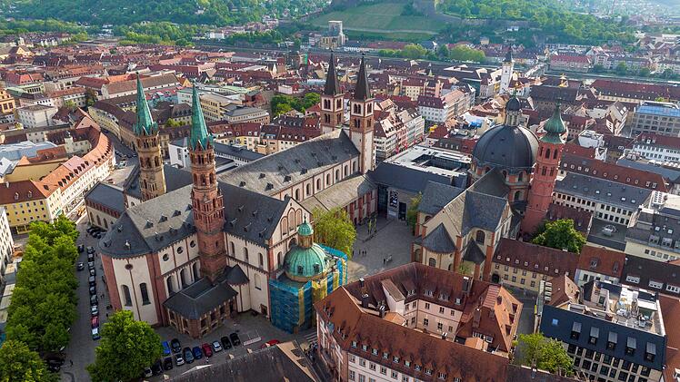 Wurzburg Historical Center Aerial Drone Photo. Old Main Bridge, Wurzburg Cathedral, Marktplatz and walking People. Wurzburg Historical Center Aerial Drone Photo. Alte Mainbr&uuml;cke, W&uuml;rzburger Dom, Marktplatz und spazierende Menschen.Luftbild Drohne W&uuml;rzburg drone shot Wurzburg Historical Center Aerial Drone Photo. Old Main Bridge, Wurzburg Cathedral, Marktplatz and walking People