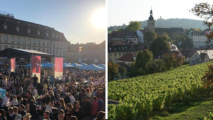 Menschenmenge auf einem Weinfest bei Sonnenschein, mit roten Bannern. Im Hintergrund eine Stadtansicht mit Kirche und Weinbergen. Festliche und kulturelle Atmosphäre.