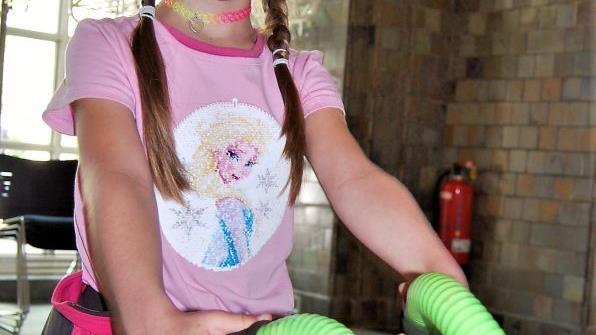 Die fünfjährige Luana will auch dem Ausstellungsmotto entsprechend "gesund älter werden". Foto: Sigismund von Dobschütz