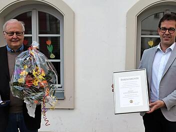 Günter Friedlein (links) und Bürgermeister Jürgen Gäbelein