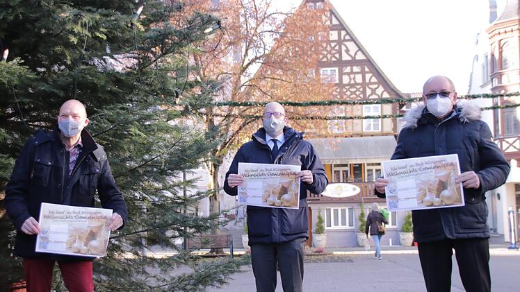Ralf Ludewig (von links), Oberbürgermeister Dirk Vogel und Klaus Bollwein wollen die Geschäfte während des Lockdowns  mit dem Weihnachtsgewinnspiel "Ich kauf' in Bad Kissingen" unterstützen. Benedikt Borst