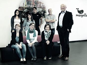 Verlagsleiter Rebscher (rechts) mit (stehend von links) Bettina Lauterbach, Kristine Benthaus, Christian Keller, Alois Englert und (vorne von links) Katharina Nüßlein, Nina Strugholz und Marion Perko. Foto: Magellan