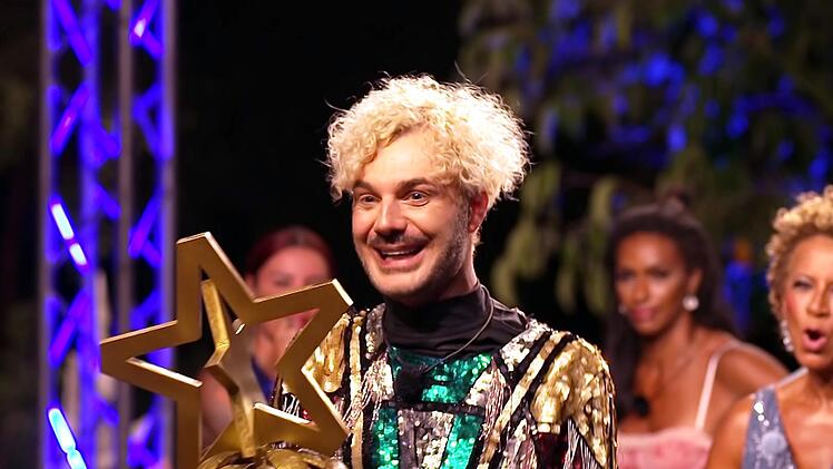 Sam Dylan hei&szlig;t der Sieger von "Kampf der RealityAllstars" (RTLZWEI): Von seiner Siegpr&auml;mie gab er den letzten Mitstreitern je 2.000 Euro ab - den h&auml;sslichen Pokal hat er hoffentlich vor Ort begraben.