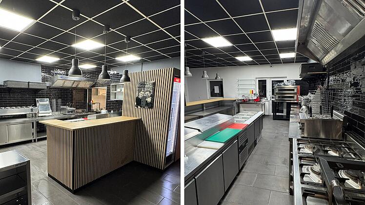 Moderne Pizzeria-Küche mit schwarzer Kachelwand, Edelstahlgeräten und Holztheke. Deckenbeleuchtung sorgt für helles Ambiente. Ideal für neue Filiale von "Abramo" in Oberhaid.